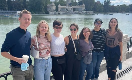 Teach in Spain participants standing by the water