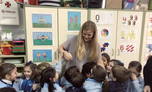 Teaching assistant with her young students in Spain