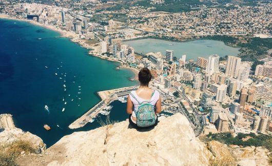 Alicante girls on cliff over city