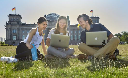 students berlin laptop lawn