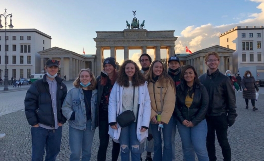 berlin students at gate shadow sunset