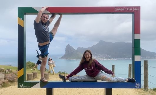 cape town students pose with south africa sign ocean