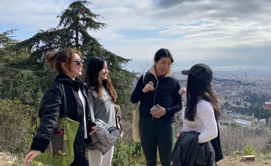 city overlook students laughing together barcelona