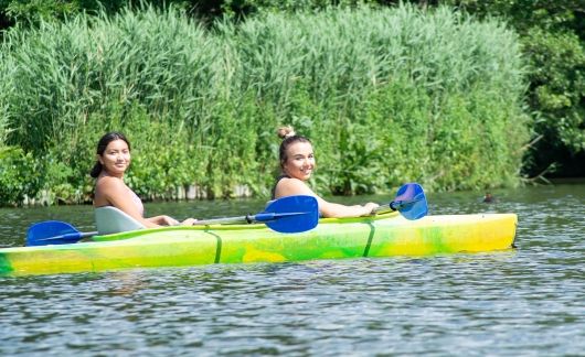 High school students kayaking in Amsterdam