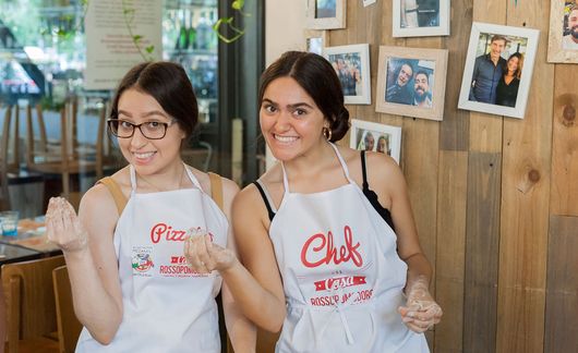 High school girls in a cooking class in Rome