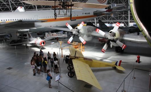 High school students looking at airplanes in a museum in Toulouse