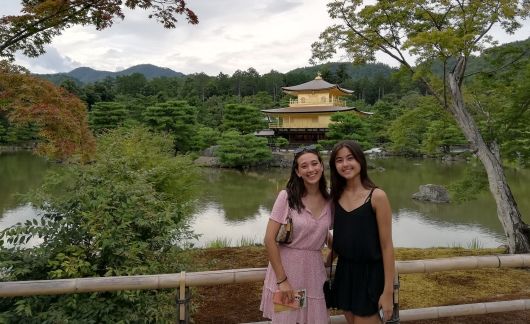 kyoto students together yellow shrine lake