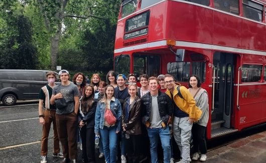 London students by double decker bus