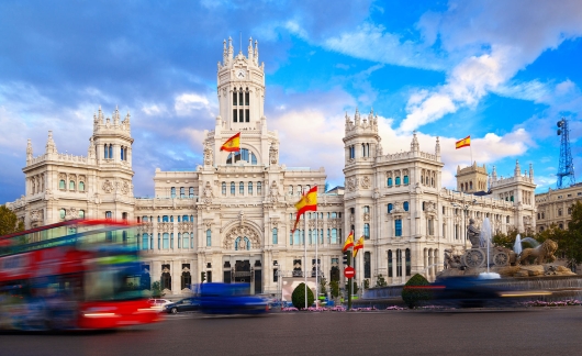 madrid traffic circle building flags