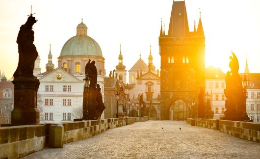 Prague Charles Bridge statues at sunrise