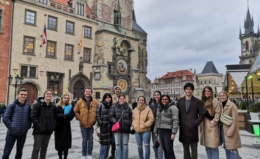 Prague group of students standing in front of Astral Clock