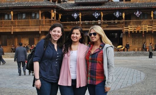 students smiling together abroad shanghai