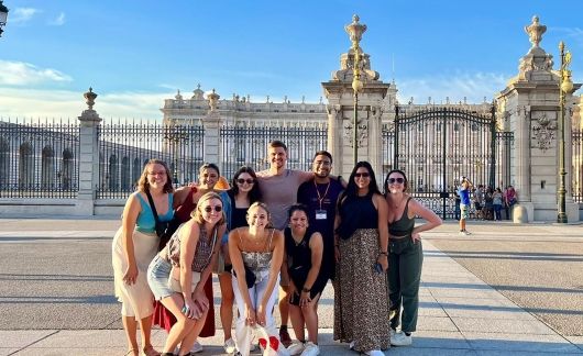 Teach in Spain participants in front of Royal Palace