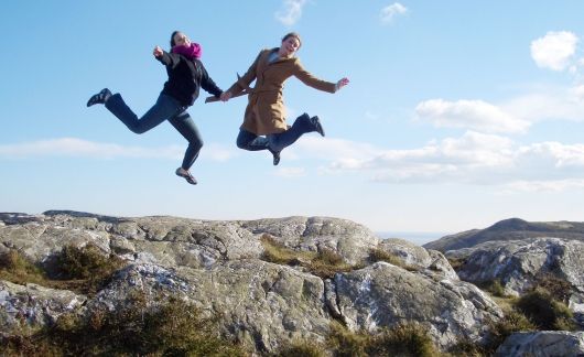 dublin students jumping in air