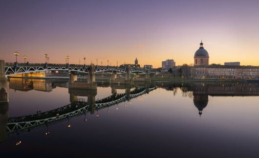toulouse river and bridge at twilight