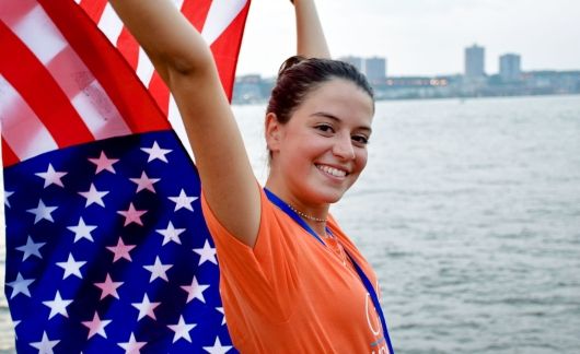 hsusa student holding american flag in NYC harbor