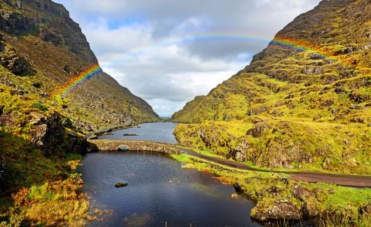 Rainbow over a bridge in Ireland