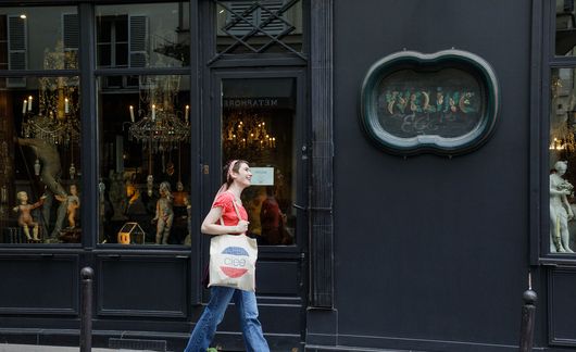 female student walking in paris france.jpg