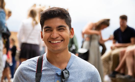 Seville student smiling during a visit to the gardens of the Alhambra