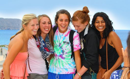spain_alicante_female-participants-smiling-with-ocean-in-background.jpg