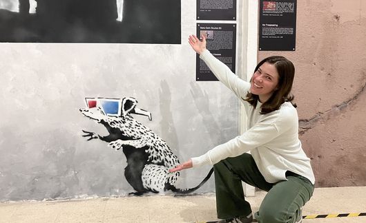 banksy museum abroad student posing
