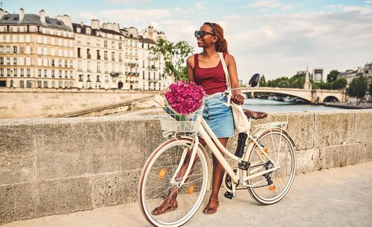 girl biking abroad paris france