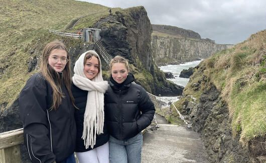 High school students on a bridge in the mountains of Ireland