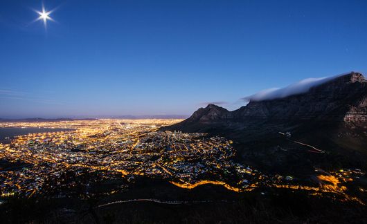 cape-town-bright-star-over-city-night