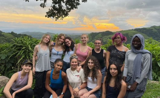 high school students in forest of Montverde at sunset
