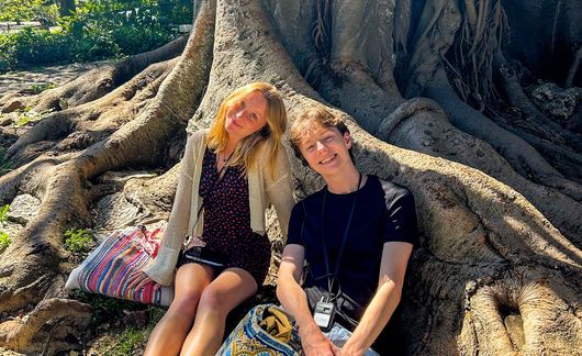 lisbon_students-leaning-on-tree.jpg