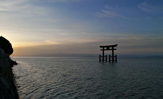 sun-rises-on-a-shinto-shrine-torii-gate-in-lake-biwa-near-kyoto-japan.jpg