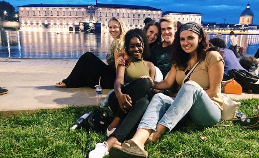 group-shot-sitting-in-grass-toulouse-france.jpg