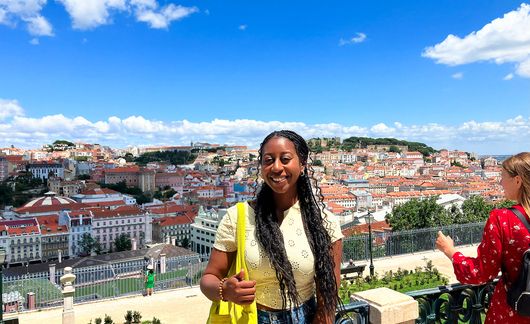 lisbon-student-posing-city-skyline-view