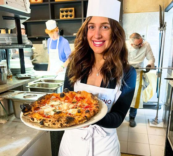 Florence girl showing off pizza she made