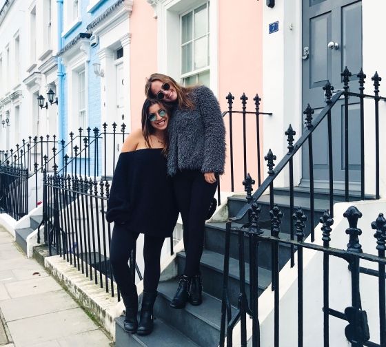 london students standing in front of townhouses