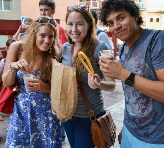 madrid students with churros street food