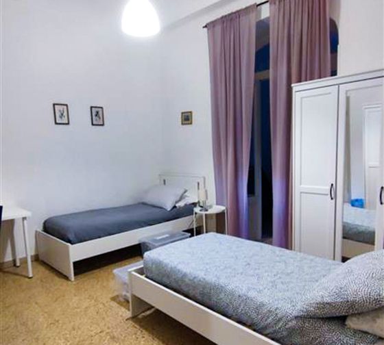 florence-housing-25-apartment-shared-bedroom-blue