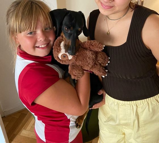 Buenos Aires student with host family and dog 