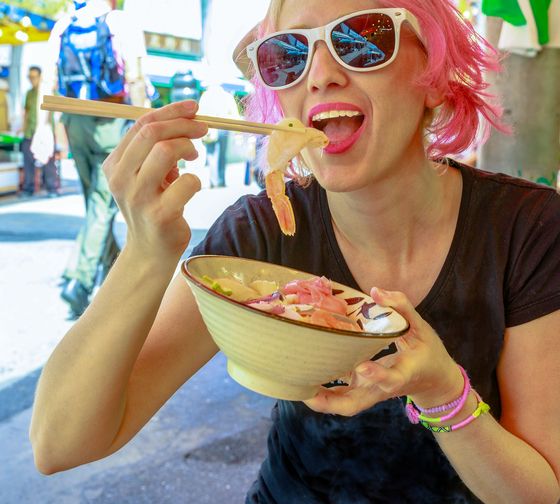 tokyo-female-student-eating-sashimi-salad
