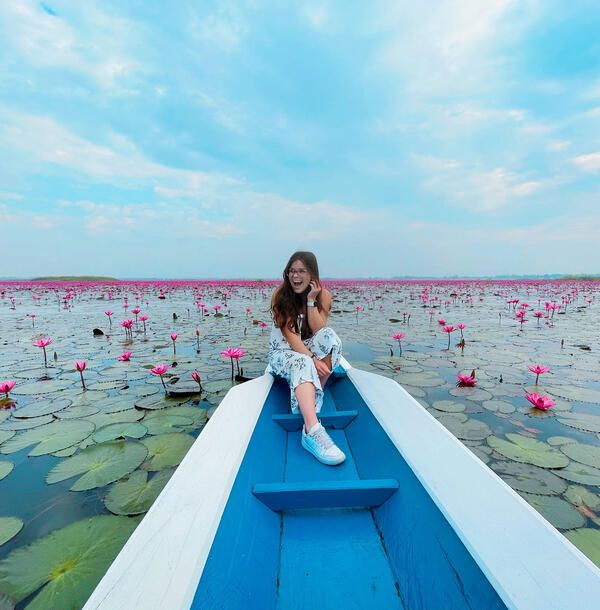 student on boat in Thailand.jpg