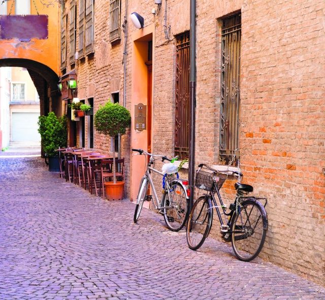 Bicycles in an alley in Ferrara, Italy