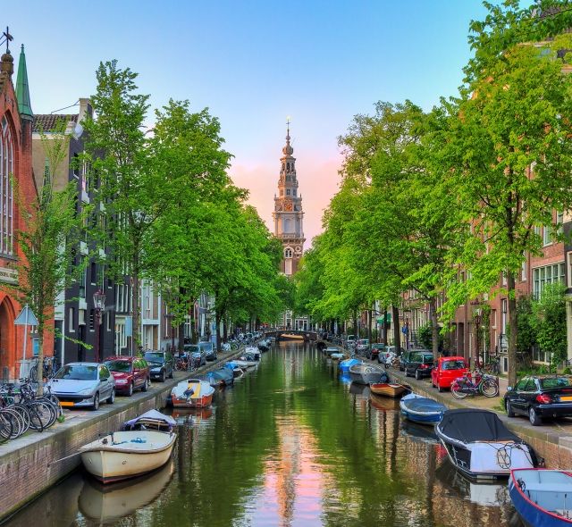 amsterdam canal sunset buildings