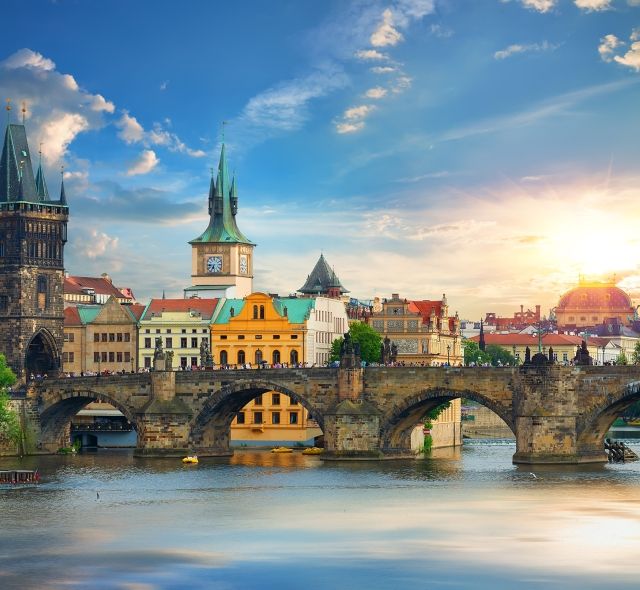 Prague river bridge sunset