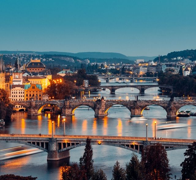 prague bridges at night