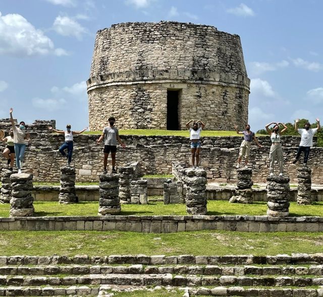 yucatan students standing ruins
