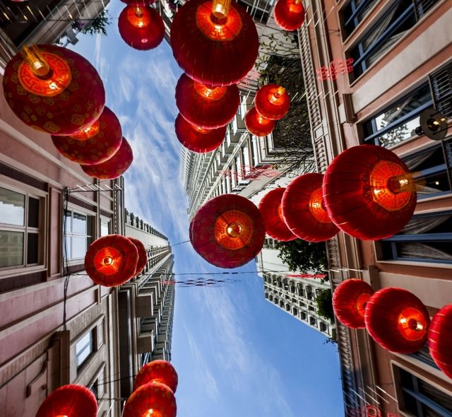 singapore lanterns in street from below