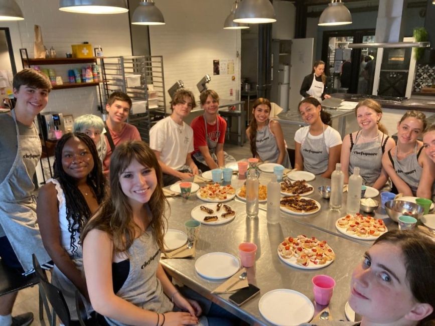 Group picture with all baked pastries ready to eat