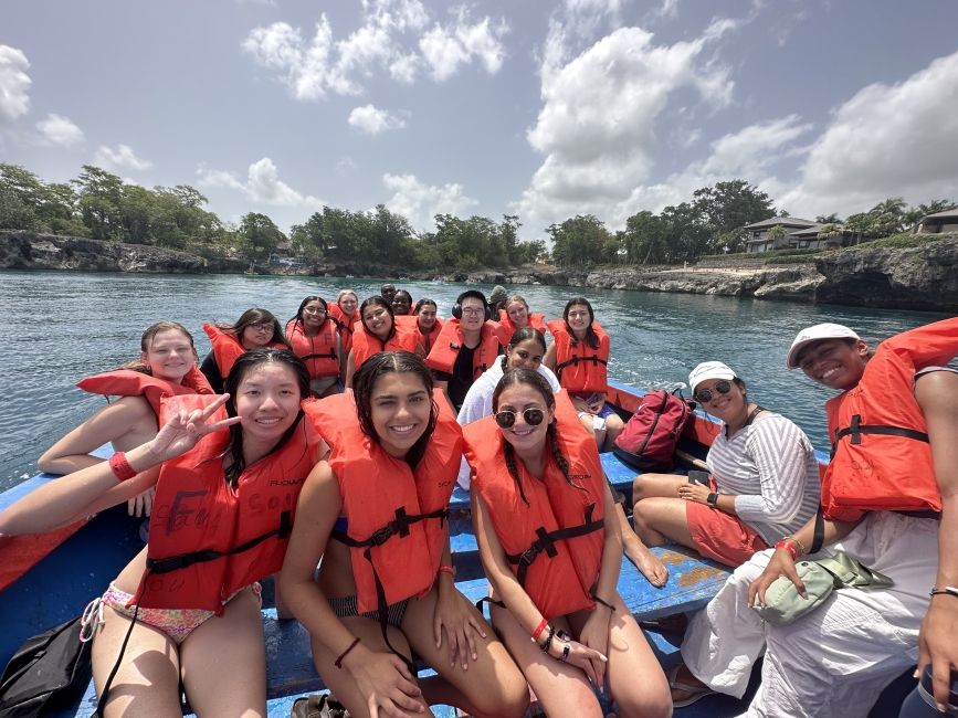 Boat ride to the natural pool!