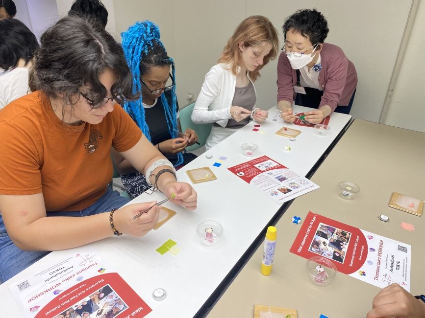 Students working on their Tsumami-Zaiku flowers