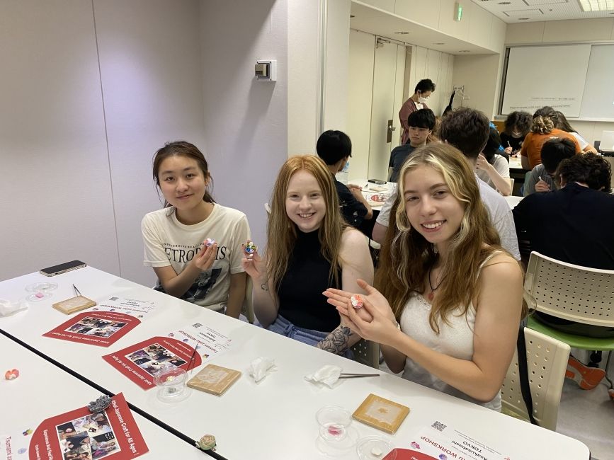 Students showing off their Tsumami-Zaiku flowers